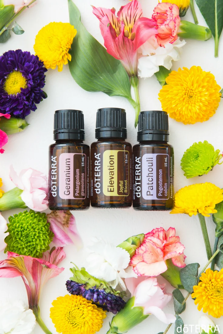 A selection of dōTERRA CPTG essential oils including Geranium and Patchouli for holistic health in NZ.
