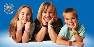 Family wearing Life Energy Designs wristbands for personal 5G protection and improved well-being.